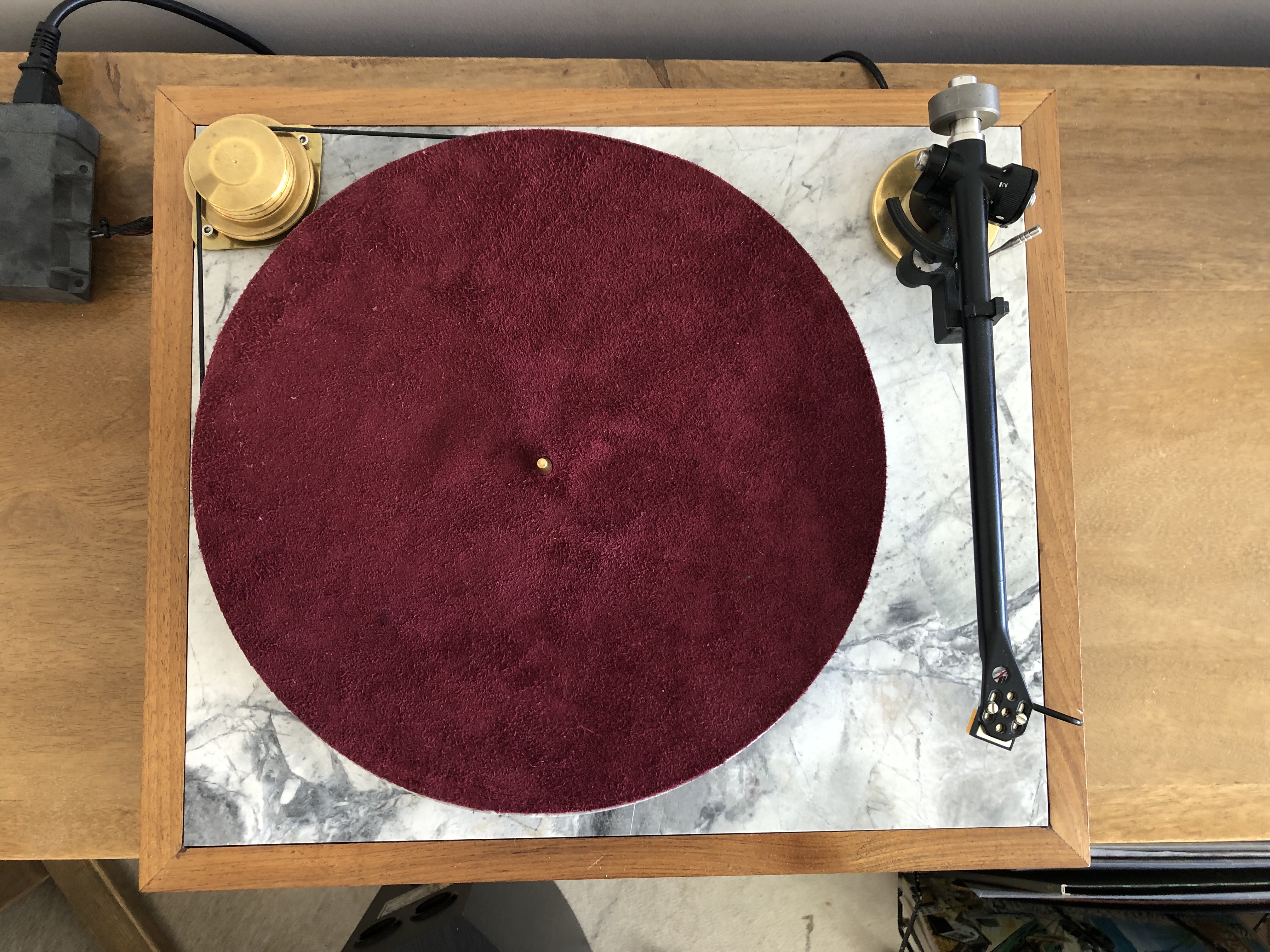 Burgundy suede platter mat, top-down view